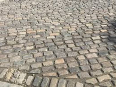 Liverpool Paving and Driveway Contractors Laying Cobblestones in Liverpool